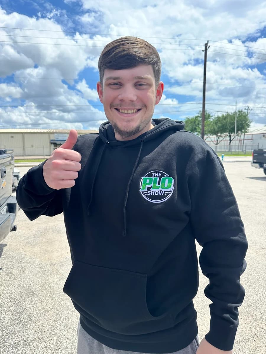 PLO Show fan wearing the black hoodie