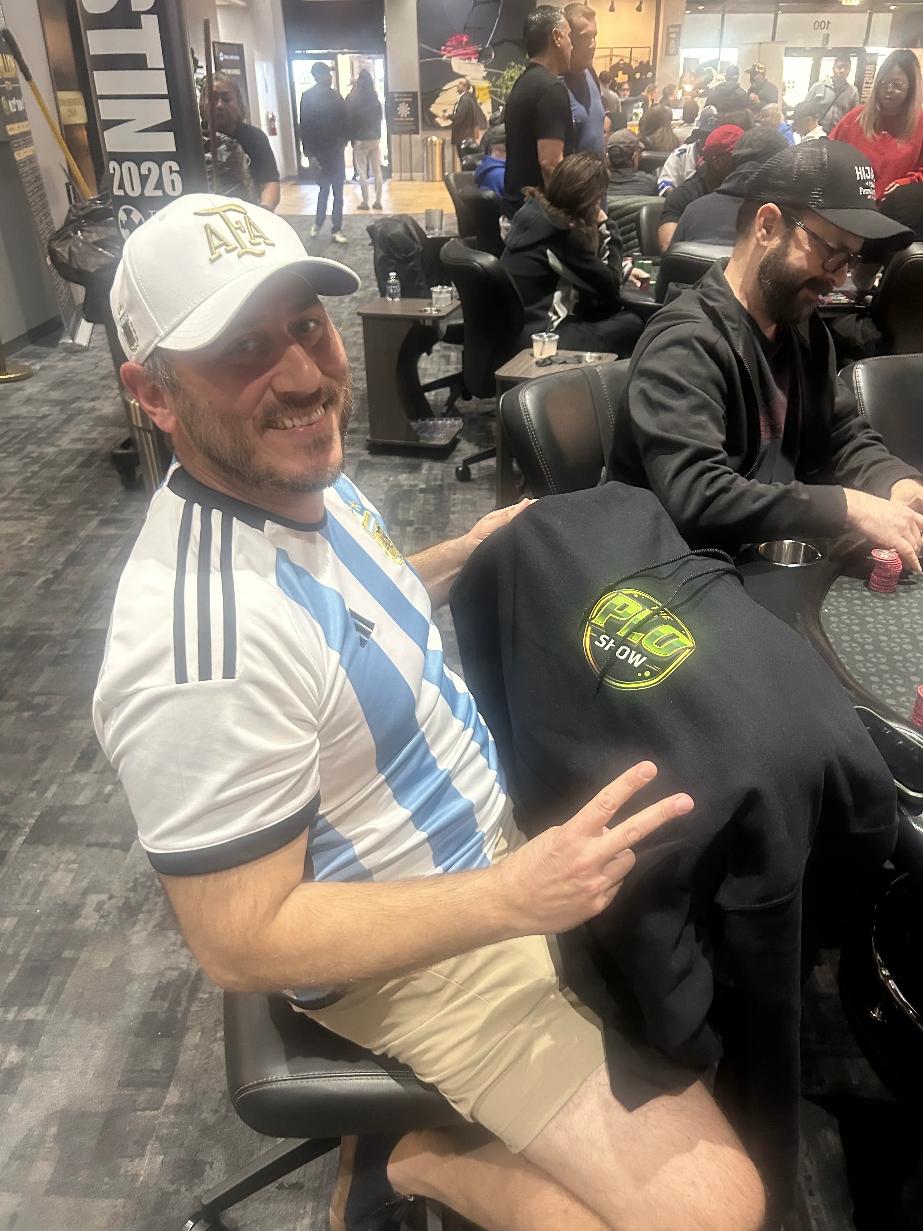 International PLO Show fan repping the brand at a poker tournament